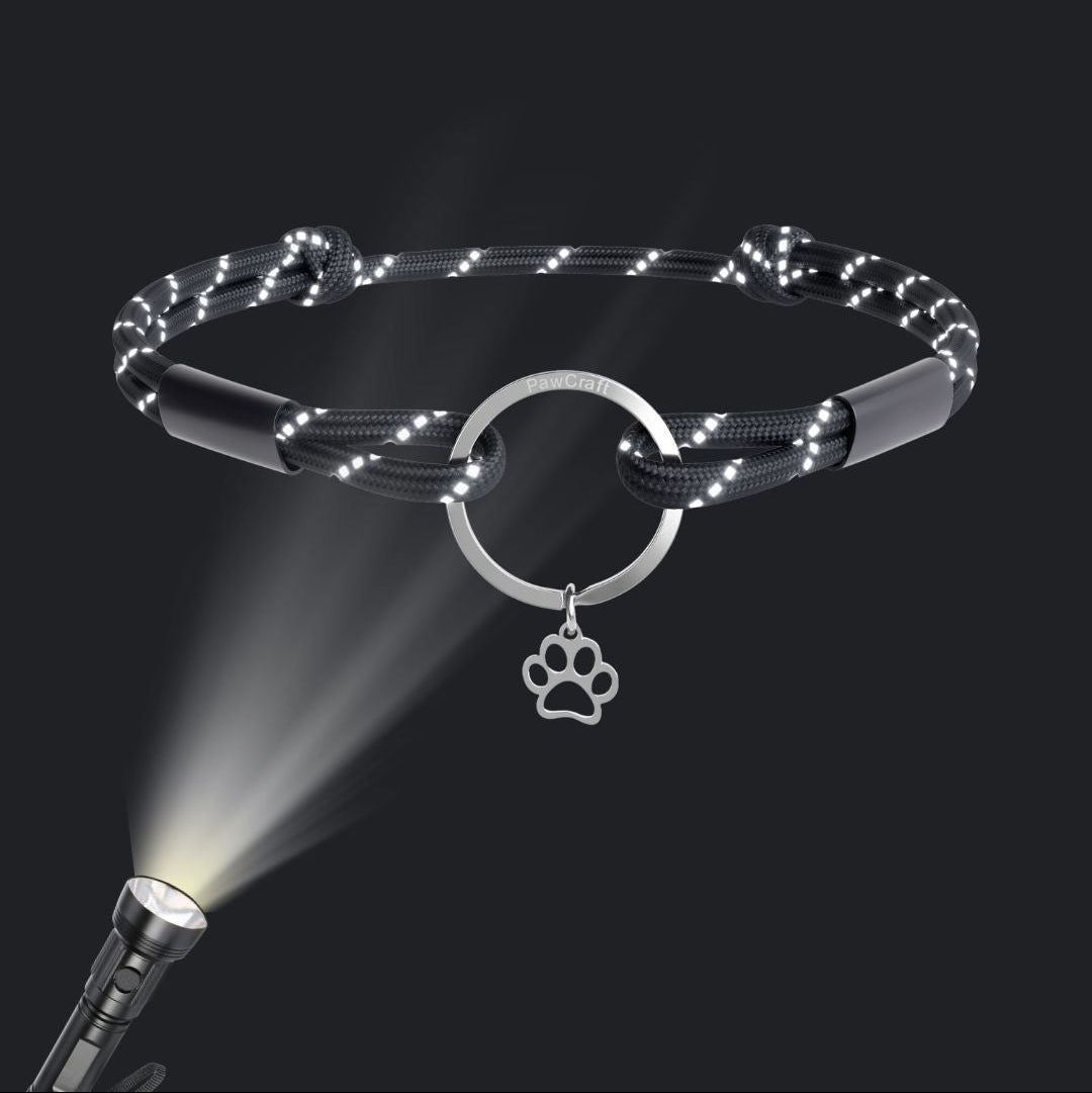 TagHug Reflective Black paracord ID tag collar, close-up of dark reflective paracord weave.